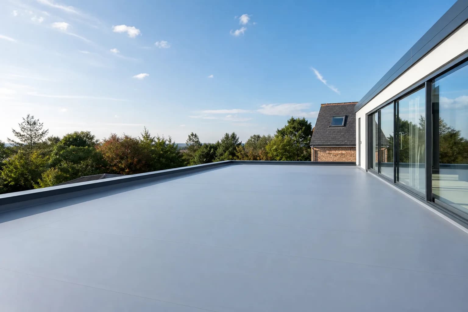 Newly installed flat roof on a modern house extension in Hampshire